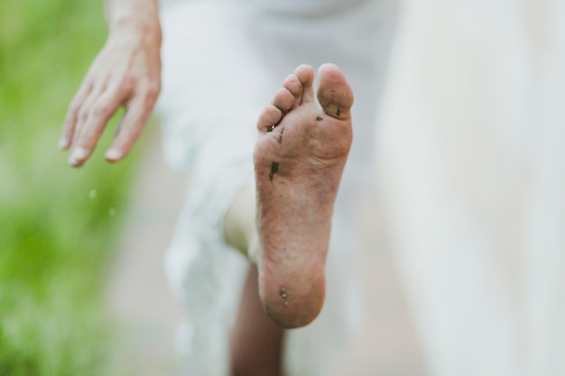 Foot of barefoot woman