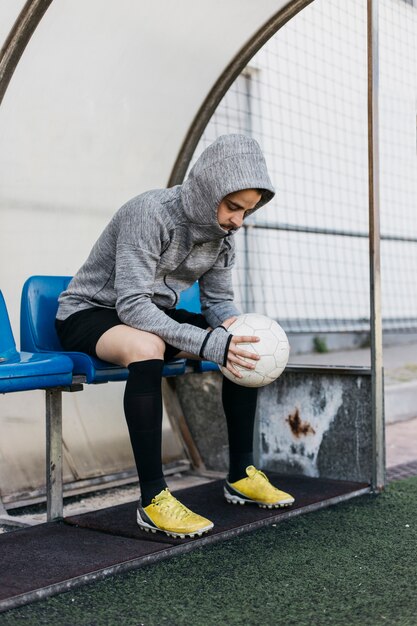 Football player on bench