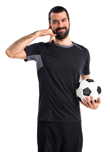 Football player making phone gesture