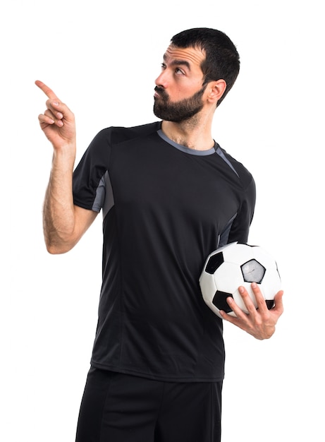 Free photo football player thinking