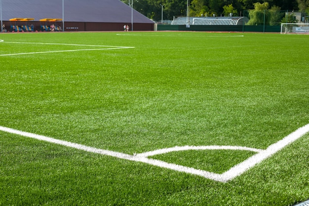 Football soccer field corner with white marks