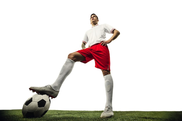 Football or soccer player on white background  motion action activity concept