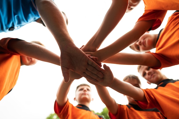 Football trainer teaching his pupils