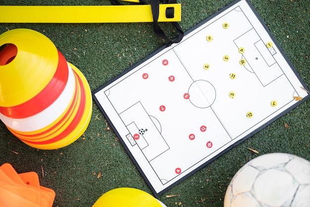 Football trainer teaching his pupils