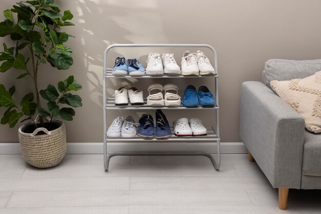 footwear stacked in shoe rack indoors