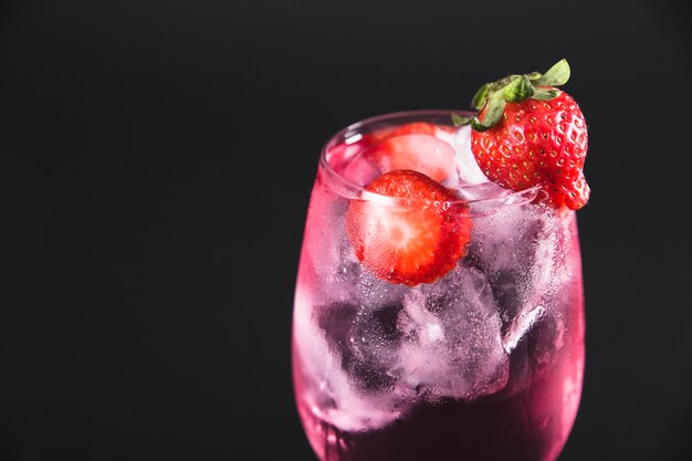 Foreground of strawberries' cocktail