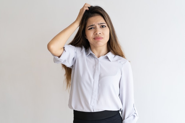 Forgetful puzzled office employee