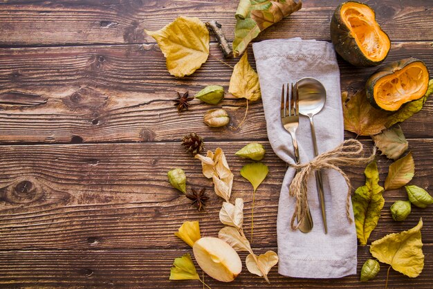 Fork and spoon on grey napkin