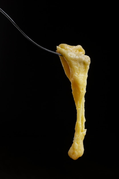 Fork with melted cheese