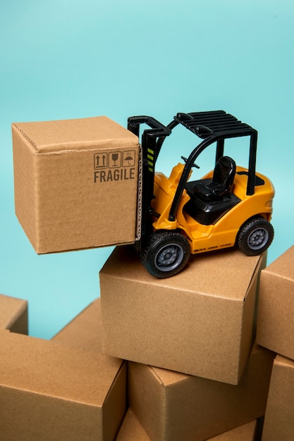 forklift carrying box supply chain concept