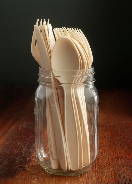 Forks and spoons in jar
