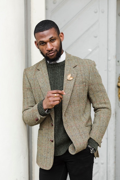 Formal man posing while standing