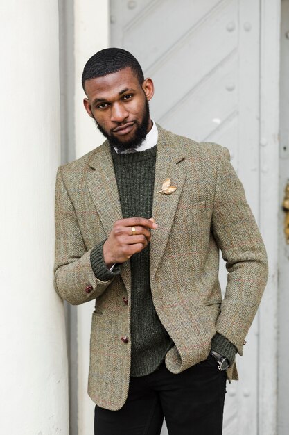 Formal man posing while standing