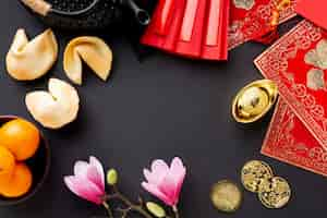 Free photo fortune cookies and magnolia chinese new year