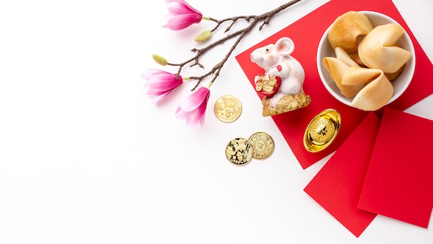 Fortune cookies and rat figurine chinese new year