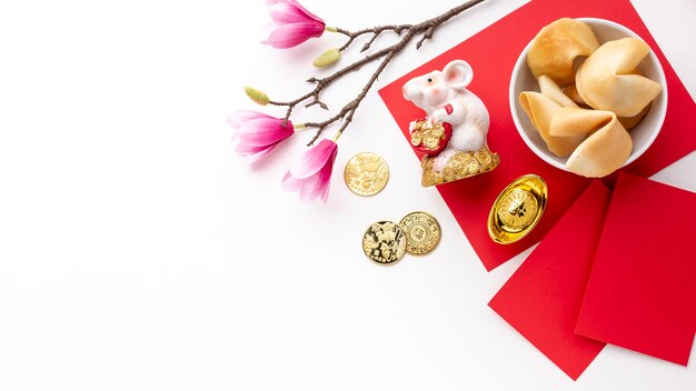 Fortune cookies and rat figurine chinese new year