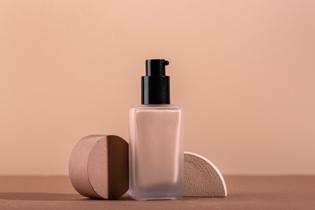 Foundation bottle advertising with shapes