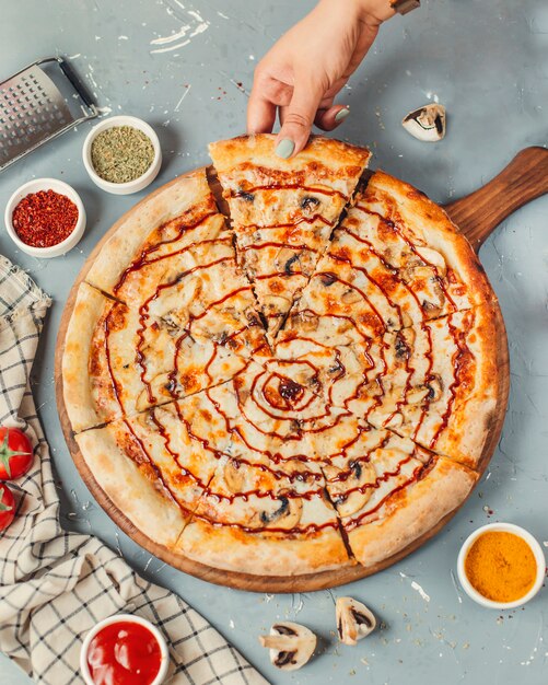 Four cheese pizza on wooden board