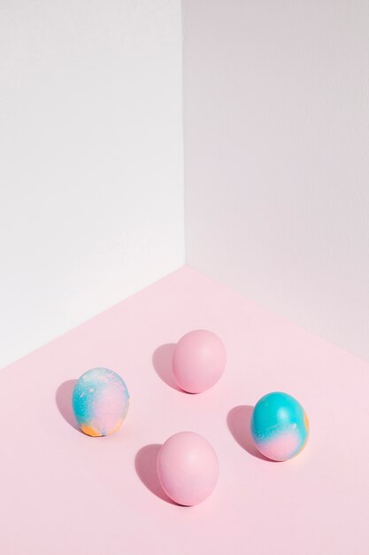 Four Easter eggs scattered on table