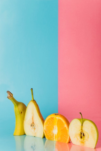 Free photo four fruits cut in half