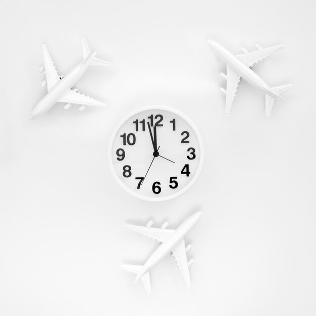 Frame of airplanes and clock