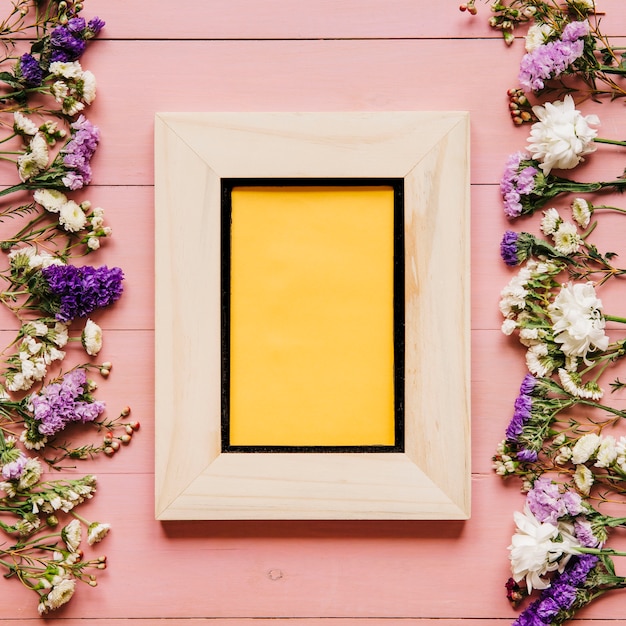 Free photo frame and arranged flowers