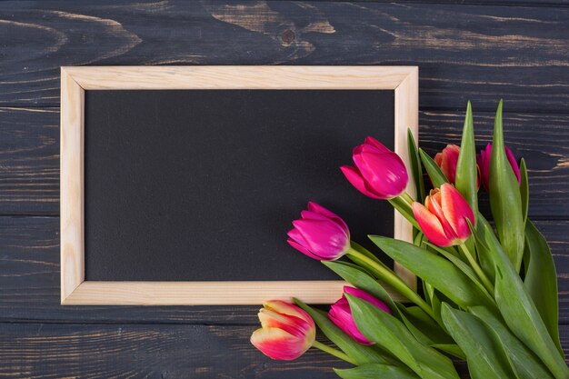 Frame chalkboard with flowers