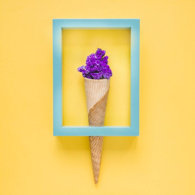 Frame on cone with flowers