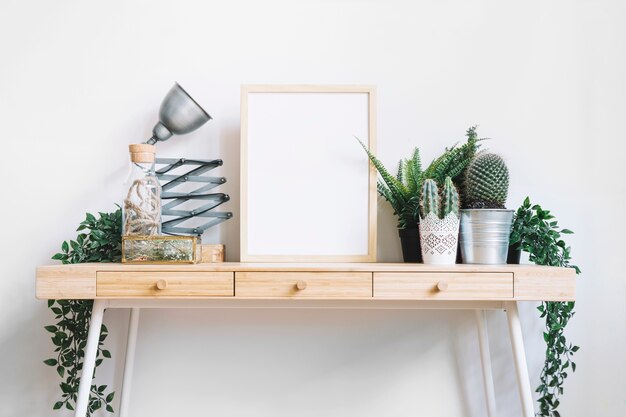 Frame and plants on desk