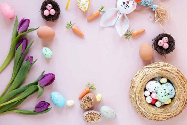 Frame of rabbit, flowers and eggs