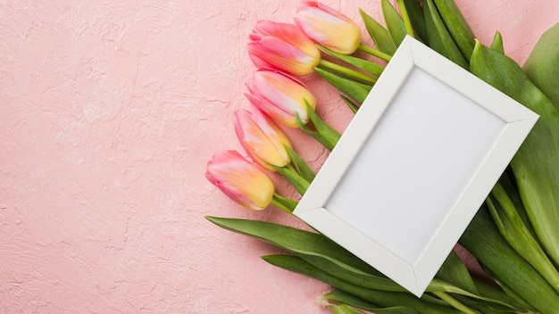 Frame on top of tulips bouquet