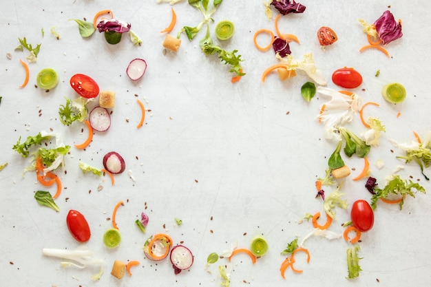 Frame of vegetables on table