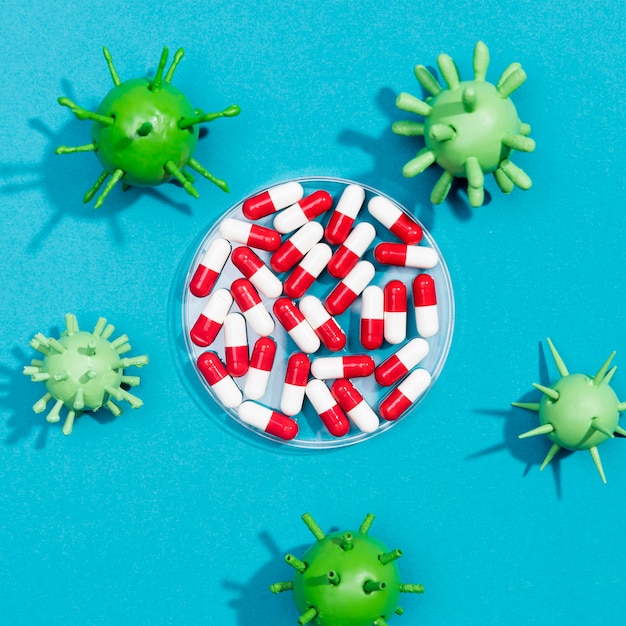 Foto gratuita cornice di batteri virus con pillole