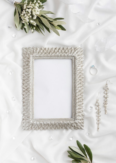 Free photo frame with bride jewellery beside