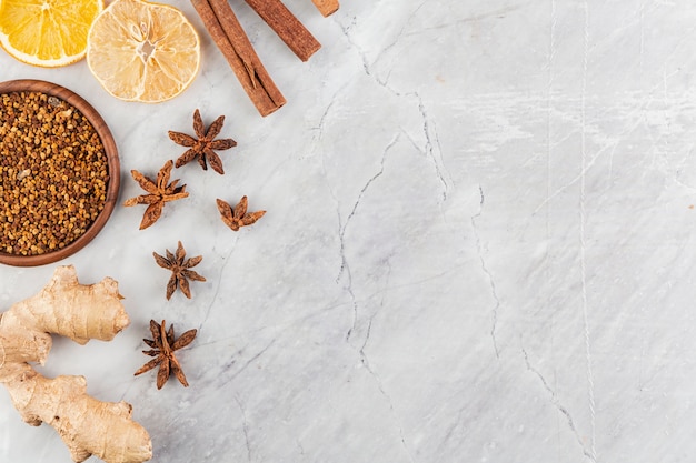 Frame with citrus slices and marble background