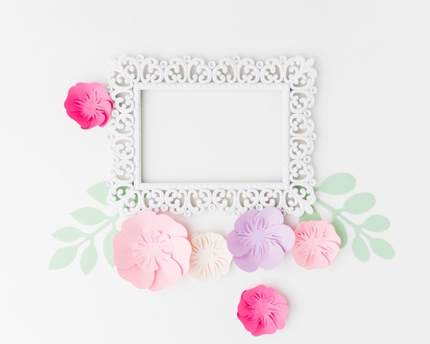 Frame with floral paper ornament