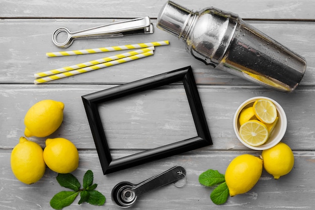 Frame with lemons and shakes