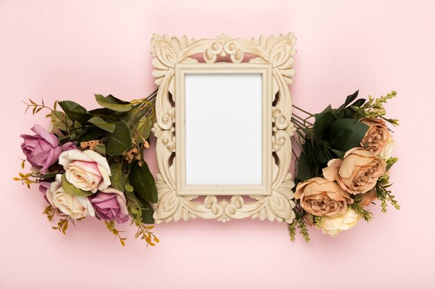 Frame with roses beside