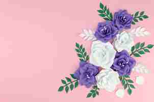 Free photo frame with spring paper flowers on pink background