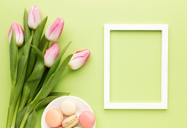 Frame with tulips beside