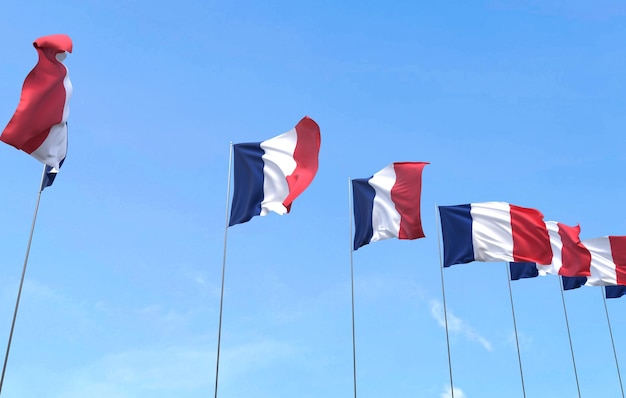 Free photo france flag waving on blue sky background