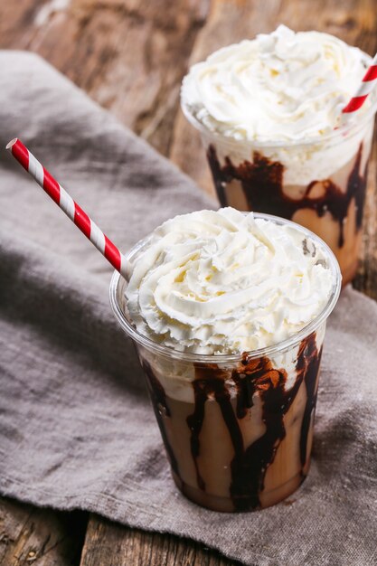 Frappe coffee on wooden table