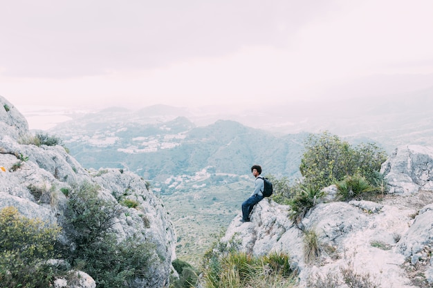 Free photo freedom concept with hiker on mountain