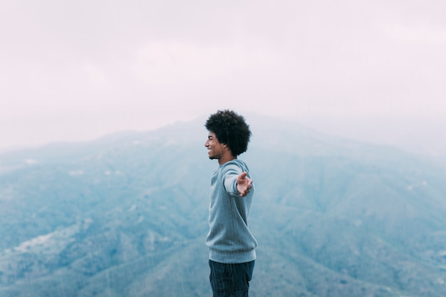 Free photo freedom concept with hiker on mountain