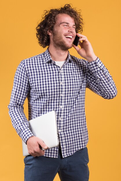 Freelance concept with man making phone call