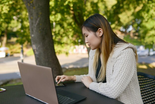 Freelancer working outdoors