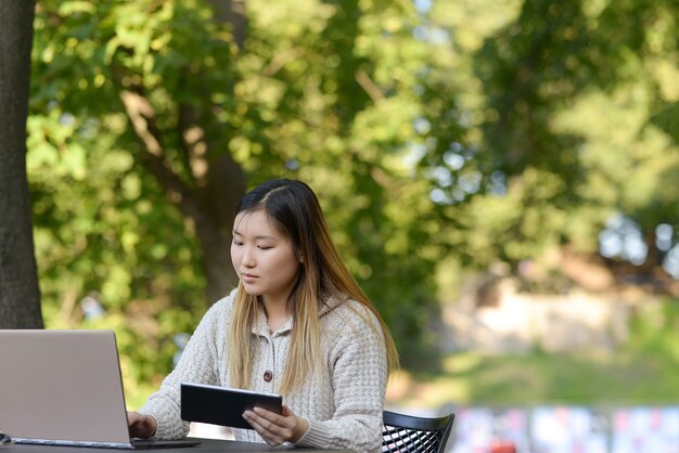 Freelancer working outdoors