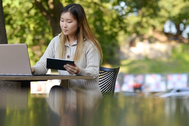 Freelancer working outdoors