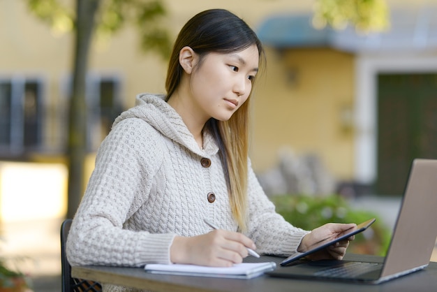 Freelancer working outdoors