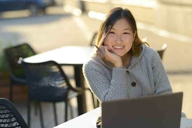 Freelancer working outdoors